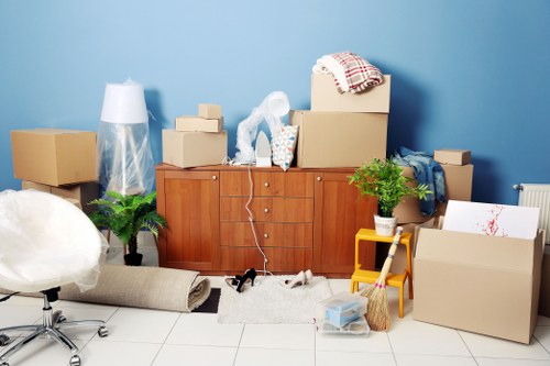 House movers working near Camberwell streets with moving boxes