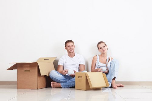 Professional movers loading items for a local Camberwell house or flat move