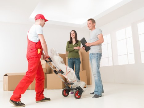 Professional movers handling furniture and boxes during a Camberwell move