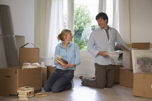 Business relocation setup with labeled boxes and office furniture