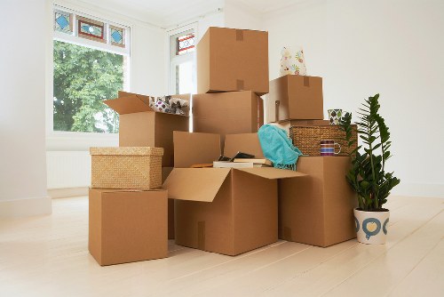 Packed office furniture and boxes ready for transport in Camberwell