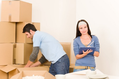 Packed office furniture and boxes ready for relocation